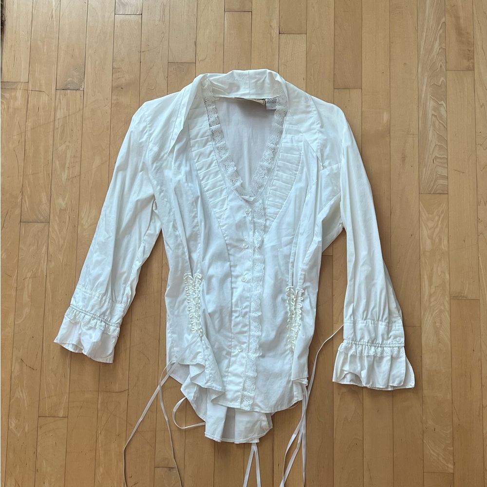 White ruffle blouse